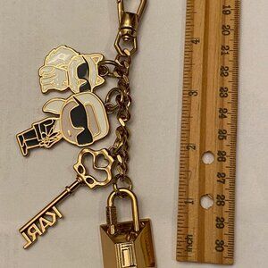 Authentic Karl Lagerfeld Paris Handbag Hang Tag. Metal/Enamel. Brand new